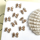 50pcs Leopard Print Bow Nail Art Decorations 10mm 3D Resin Leopard Ribbon Nail Charms Leopard Designs Acrylic Nail Art Supplies